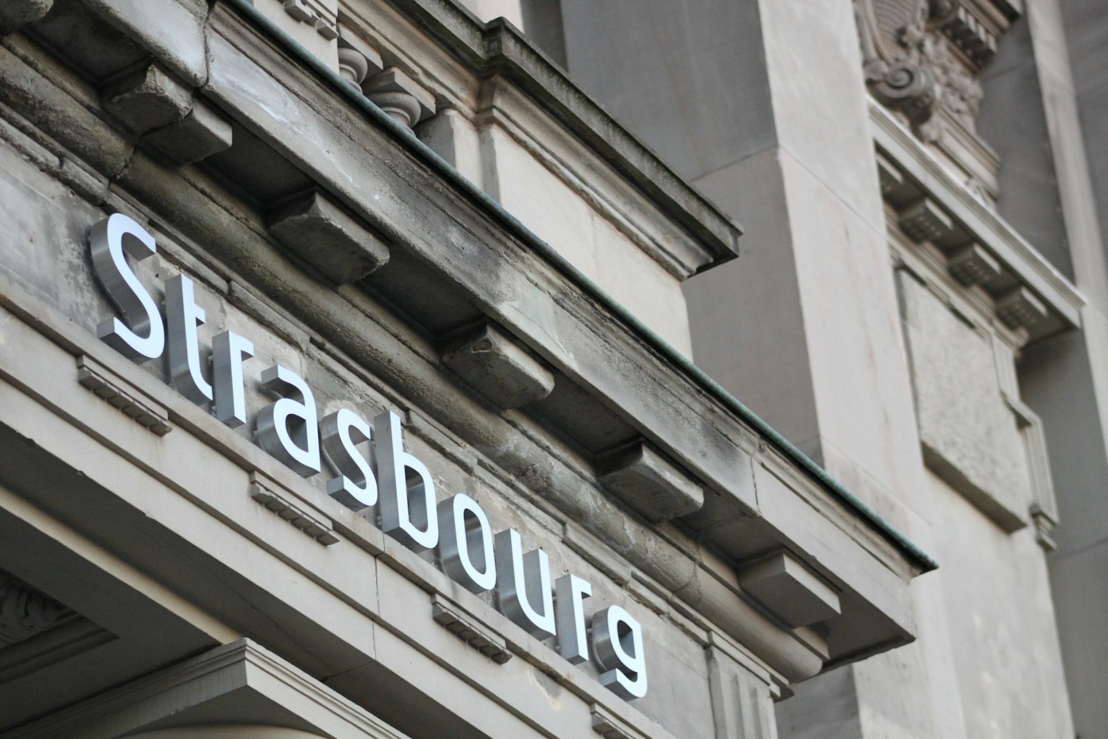 a close up of a building with a sign on it